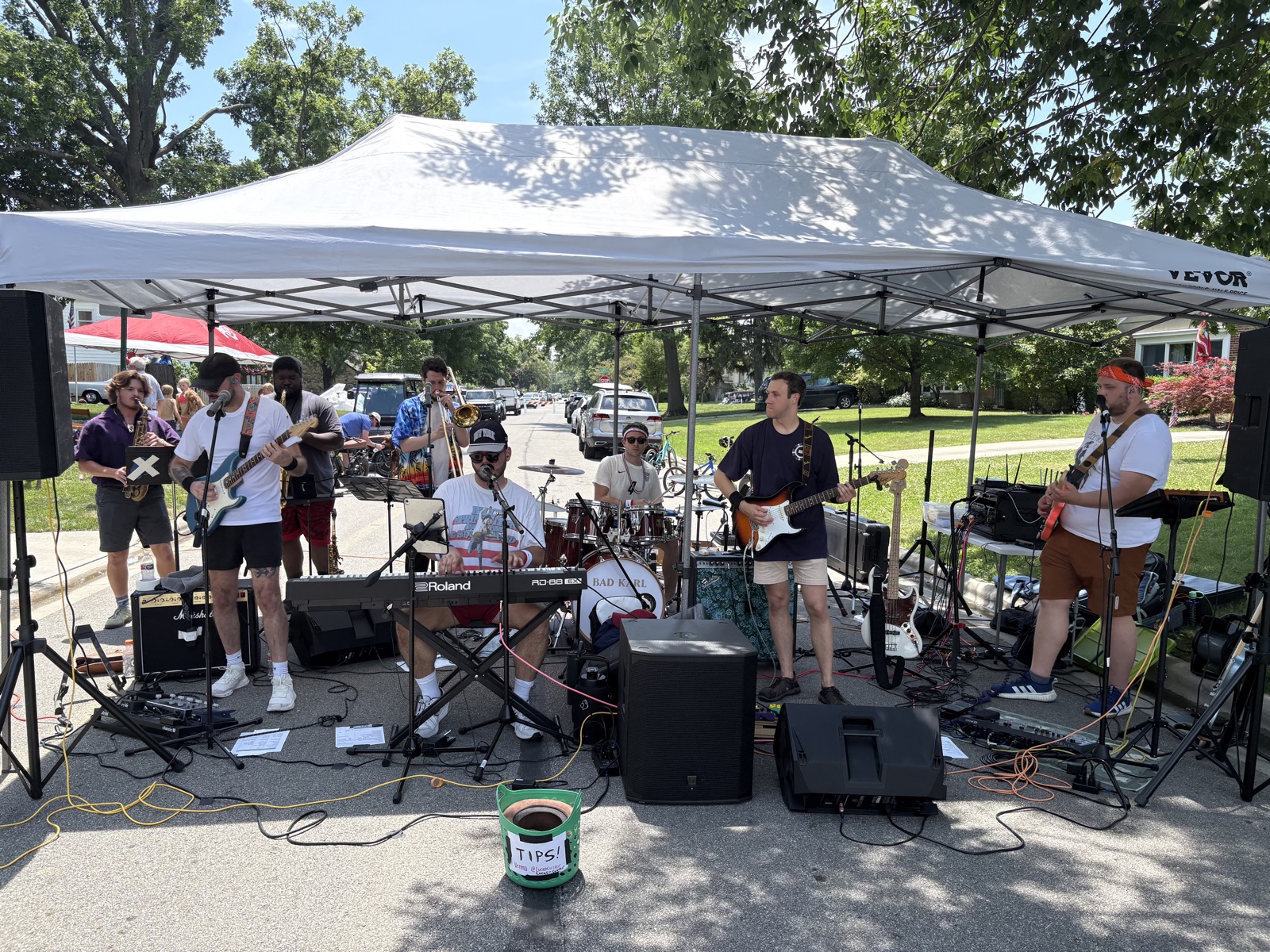 Bad Karl playing a street fair under a tent